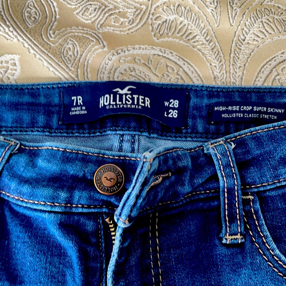 Dark blue distressed hollister skinny jeans